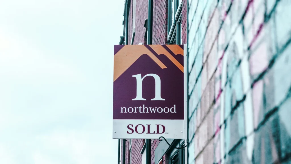 sold sign on property